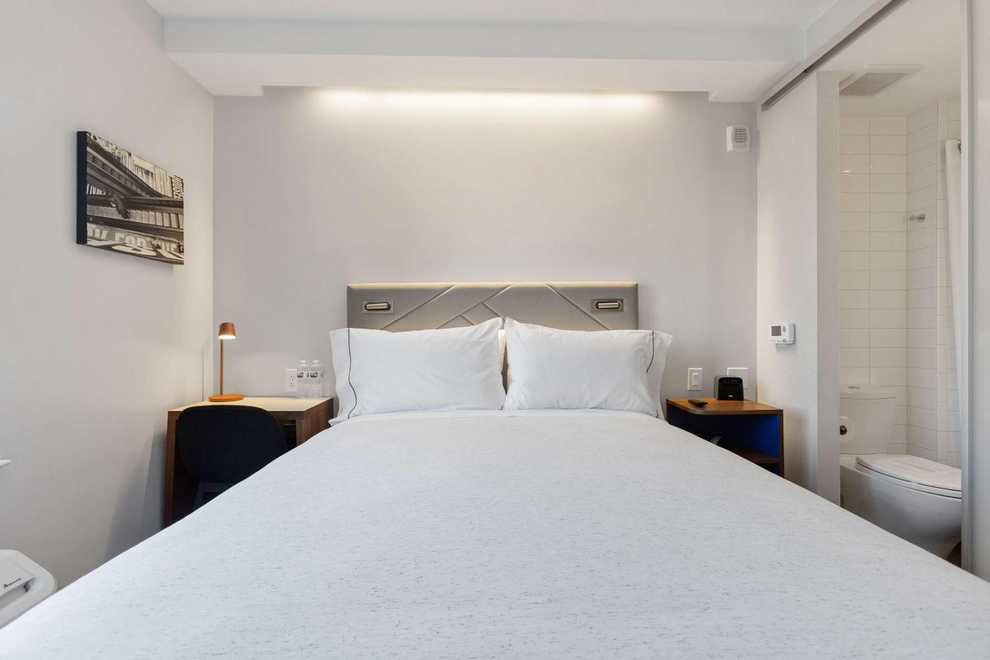 Compact Room One Full Bed