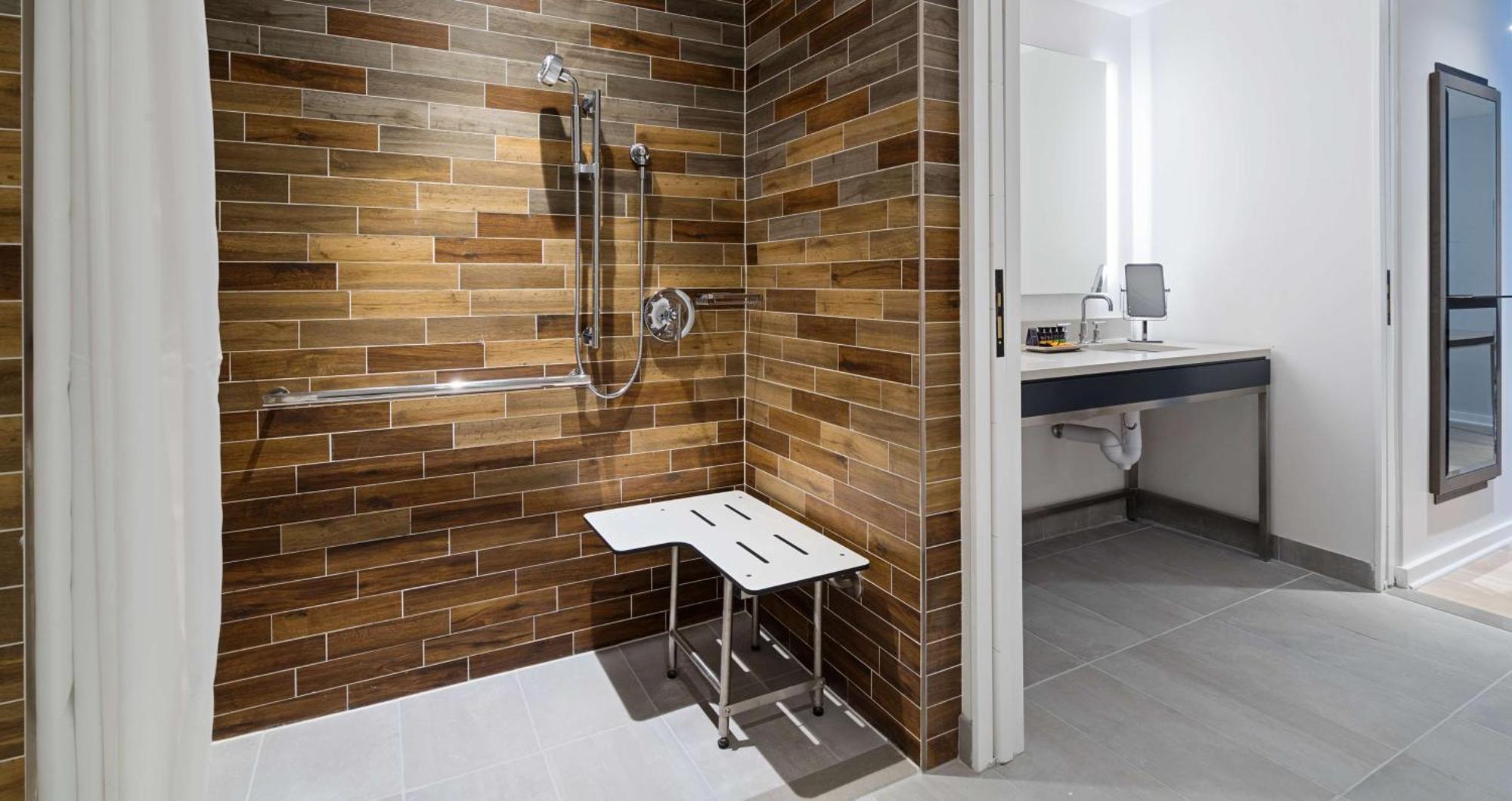 Queen Room River View or Mobility Accessible Roll Shower